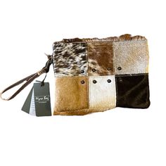 Myra Upcycled Bag New With Tags Wristlet With Leather Handle Calf Hair Patchwork Browns, Cream, Black, Tan Neutral 10.75” L X 7.5”H X 1.5”W Brown Square Clutch For Daily Use, Beige Square Clutch For Daily Use, Beige Wristlet With Removable Pouch, Brown Rectangular Wristlet For Everyday Use, Adjustable Brown Clutch For Everyday Use, Brown Everyday Rectangular Wristlet, Everyday Brown Rectangular Wristlet, Adjustable Beige Rectangular Wristlet, Cream Rectangular Wristlet For Travel