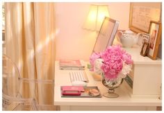 an image of a desk with flowers on it and a card that says organizing your desk