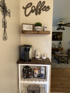 the coffee bar has two shelves on each side