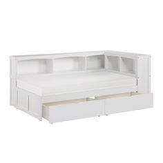 a white bed with two drawers underneath it