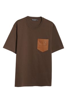 A rich leather patch pocket embossed with a plaque-style logo elevates a soft cotton T-shirt crafted as part of the fashion house's Palermo collection. 30" length (size 42 US) Crewneck Short sleeves Chest patch pocket 100% cotton with leather contrast Dry clean or machine wash, dry flat Made in Italy Designer Clothing Brown Cotton T-shirt With Pockets, Casual Leather Tops With Pockets, Brown Leather Casual Tops, Casual Brown Leather Top, Casual Brown Leather Tops, Classic Brown Tops With Patch Pockets, Luxury Tops With Pockets, Brown Crew Neck T-shirt For Work, Leather Pocket