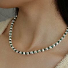 Product Details:Material: 18K gold plated / freshwater pearl (6-7mm) / natural stoneSize: inner circumference about 46-51cmWeight: about 26gProduct Description:This handcrafted green natural stone beaded pearl necklace is an elegant choice. It's plated with 18K gold, with fresh water pearls and a captivating shade of green. Perfect for adding a touch of glamour to your look. Green Beaded Necklace With Pearl Drop For Gift, Elegant Green Pearl Necklace With Natural Stones, Green Pearl Drop Necklace Gift, Green Pearl Drop Necklace For Gift, Green Pearl Necklace For Gifting, Green Pearl Necklace As A Gift, Green Baroque Pearl Jewelry For Gift, Green Pearl Drop Beaded Necklaces, Green Pearl Necklace With Round Beads And Pearl Drop