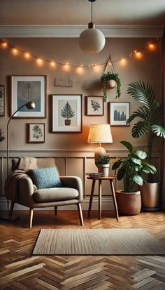 a living room with some plants and pictures hanging on the wall, lights in the corner