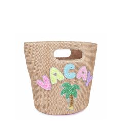 From a night out at the boardwalk to dinner by the sea, this 'Vacay' straw top-handle tote purse will add a tropically trendy touch to all of their beachy ensembles! Its shining palm tree and sparkly bubble-letter patches are sure to make your beach babe stand out from the crowd on summer days and vacays. Dimensions10”H x 8”W x 6”D Sand-colored Bucket Straw Bag For Travel, Beachy Basket Straw Bag For Vacation, Woven Straw Bucket Bag For Vacation, Vacation Woven Bucket Bag, Beach Season Shopping Bag With Bamboo Handle, Vacation Bucket Bag For Beach Season, Trendy Vacation Straw Bag With Bamboo Handle, Trendy Vacation Bucket Bag With Braided Handles, Vacation Beach Bag With Bamboo Handle