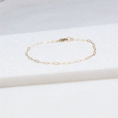 Anklets for WomenThis dainty gold anklet is stylish and perfect for everyday.  Choose your favorite chain style.  _______________________________________D E T A I L S-14kt gold filled or sterling silver-Choose your style of chain-A high quality shimmering link chain with a premium lobster clasp.  LENGTH - Please select from the drop down selection._______________________________________∙ EXTRA LOVE ∙Crafted with hand & heart just for you in the desert of our Arizona studio.All of our jewelry Minimalist Gold Chain Anklets, Skin-friendly Gold Minimalist Anklet, Dainty Hypoallergenic Anklets For Everyday Use, Minimalist Gold Chain Bracelet, Dainty Hypoallergenic Everyday Anklets, Minimalist Adjustable Chain Anklet, Minimalist Gold Anklet With Adjustable Chain, Minimalist Gold Chain Anklets As Gift, Everyday Gold Chain Anklets