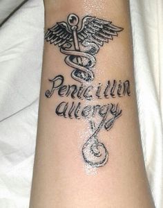 an image of a medical alert tattoo on someone's arm that reads, medic alert penicillinn allergys buddhas