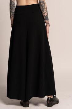 "These extremely beautiful Stylish and comfortable black flare skirt pants are a great addition to any wardrobe. The cut is diagonal which gives the pants a great fall and luxurious look. The fabric is stretchable and very soft on the body, which gives it a range in size. ONE SIZE! TOP PART: width: 75cm / 29.5\" inches Elastic band height: 10cm / 4\" inches PANT LEGNTH: Top to bottom 88cm / 34.5\" inches MATERIAL : High-quality jersey COLOR: Black Available also in cream color - https://www.etsy Bell Bottoms Black, Boho Flare Pants, Pants Bell Bottoms, Flare Pants Black, Black Hippie, Black Flared Trousers, Black Flare Skirt, Black Hippy, Womens Palazzo Pants