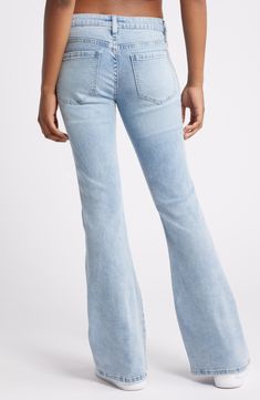 A low rise and a well-worn fade define these flare-leg jeans fashioned with plenty of flair and bling racing down the sides. 33" inseam; 23" leg opening; 8" front rise; 13" back rise (size 27) Zip fly with button closure Five-pocket style 69% cotton, 26% polyester, 3% viscose, 2% spandex Machine wash, tumble dry Imported Distressed Fitted Flares, Distressed Denim Flares, Distressed High Rise Fitted Flares, Distressed High-rise Fitted Flares, Fitted High Rise Distressed Flares, Faded Distressed Full Length Flare Jeans, Light Wash Distressed Flare Bottoms, Faded Distressed Mid-rise Flare Jeans, Faded Flare Bottoms With Frayed Hem