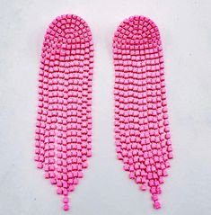 These pink studded dangle earrings are gold plated and perfect to spice up any outfit! Color is IN this spring and these are a must have! Glamorous Pink Earrings, Glamorous Pink Pierced Earrings, Glamorous Pink Earrings For Pierced Ears, Pink Chandelier Earrings For Summer Party, Trendy Pink Dangle Earrings, Trendy Pink Dangle Jewelry, Trendy Pink Dangle Tassel Earrings, Trendy Pink Drop Earrings, Trendy Pink Beaded Earrings For Spring