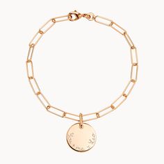 Delicate and dainty. Hand-engrave our Personalized Dainty Love Links bracelet with up to 20 heartfelt characters to transform it into the perfect personalized gift.18K Champagne Gold Plated or 925 Sterling SilverChain length & style: 7 Trace ChainCharm: 0.6 Diameter, 0.03 ThicknessCharms are not removable from this chainHand-engraved in our London workshopSent with love in a complimentary gift boxAny slight variations in lettering depth, spacing and alignment from the examples shown are part Elegant Name Bracelet With Engraving Option For Friendship, Engraved Rose Gold Sterling Silver Name Bracelet, Engraved Yellow Gold Charm Bracelet For Anniversary, Elegant Engraved Chain Bracelet For Friendship, Engraved Round Heart Bracelet For Anniversary, Engraved Rose Gold Jewelry For Friendship, Engraved Rose Gold Name Bracelet, Anniversary Engraved Yellow Gold Charm Bracelet, Engraved Rose Gold Round Bracelet