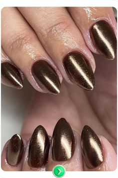 Rich brown metallic chocolate chrome nails with a deep, warm glow. The chrome finish adds a glossy look, ideal for those who enjoy a sophisticated, long-lasting design. Glossier Look, Chrome Finish, Long Lasting