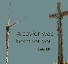 a cross with the words, a savor was born for you luke 2 11