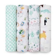 four baby swaddles are lined up on top of each other in different patterns