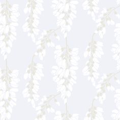 a white and beige wallpaper with leaves on it