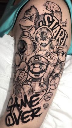 30 Epic Video Game Tattoo Ideas for Hardcore Gamers Mario Tattoo Sleeve, Cartoon Leg Sleeve Tattoo, Supermario Tattoos, Videogame Tattoo Ideas, Smash Bros Tattoo, Game Controller Tattoo, Cartoon Tattoos Sleeve, Tattoo Sleeve Anime, Mario Tattoo Design