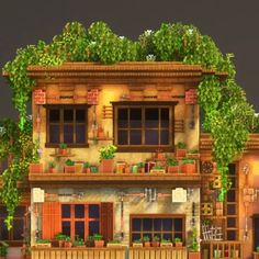 an animated house with plants growing on the windows and balconies in front of it