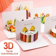 3d pop - up birthday cards are on display