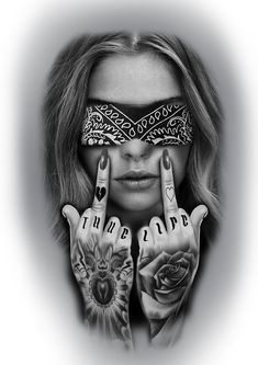 a woman with tattoos covering her eyes and holding two fingers up in front of her face