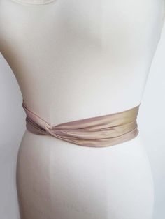 Satin Bridal Belt For Party, Elegant Cream Sashes For Formal Occasions, Elegant Fitted Beige Corset Belt, Elegant Fitted Corset Belt With Sashes, Elegant Fitted Fabric Belt, Elegant Fitted Bridal Belt, Elegant Bridal Belt With Sashes For Evening, Elegant Evening Bridal Belt With Sashes, Elegant Fitted Gold Bridal Belt