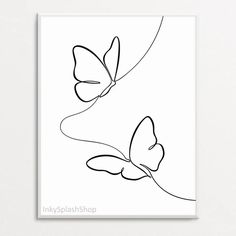 a black and white drawing of two butterflies