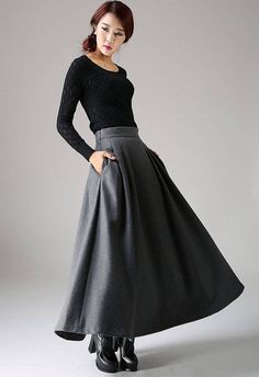 "Fluidity and elegance from this chic winter skirt. Team the wool skirt with a chunky sweater, winter boots and an over sized handbag and you're good to go, no matter what the weather throws at you! You'll really be able to turn on the charm with this versatile long pleated skirt. The gray color means that you'll match it with literally everything you own. This a line skirt will soon become a staple in your winter wardrobe collection. DETAIL * 30% wool, 30% fiber, 40% polyester * polyester linin Winter Wool Skirt, Long Skirt Winter, Long Wool Skirt, Maxi Skirt Winter, Grey Pleated Skirt, Skirt Winter, Plaid Wool Skirt, Skirt A Line, Gray Winter