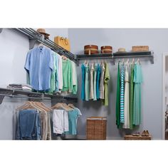 an organized closet with clothes and baskets