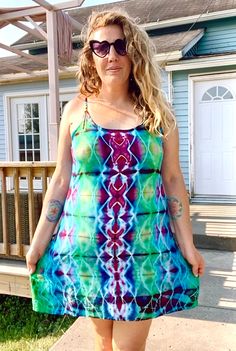 Tag says 2XL but it runs small. 100% rayon mini dress with adjustable straps. Measurements from laying flat: Pit to pit: 22 inches Hip: 24 inches Length: 34 inches