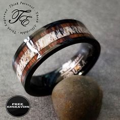 the ring has been made from wood and is ready to be used as a wedding band