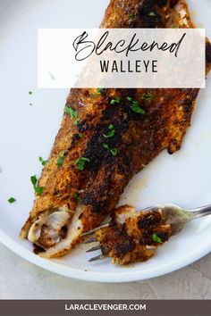 grilled walleye on a white plate with a fork and parsley garnish