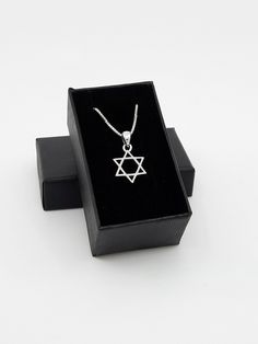 Dainty Star of David necklace small size star pendant great for boys and girls, gift for mom made from 925 sterling silver White Gold Star Of David Jewelry For Gift, White Gold Star Of David Jewelry Gift, Silver Star Of David Charm Necklace For Gifting, Silver Star Of David Charm Necklace For Gift, Silver Star Of David Charm Necklace As Gift, Star Of David Necklace For Gift, Silver Star Of David Necklace For Hanukkah, Star Of David Necklace For Hanukkah Gift, Sterling Silver Star Of David Jewelry Gift