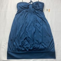 B Darlin Dress Adult 7/8 Blue Strapless With Neck Tie Bra Top Knee Length New Excellent Condition Without Any Flaws. Size Is Womens 7/8 The Dress Is Designed To Flatter Your Figure, With A Comfortable Fit That Will Make You Feel Confident And Elegant. Whether You're Heading To A Party Or A Wedding, This Dress Is Sure To Turn Heads. So Why Wait? Add This Gorgeous B. Darlin Dress To Your Wardrobe Today And Get Ready To Shine! If You Have Any Questions Or Concerns, Please Let Me Know. Check Back Of Blue Stretch Strapless Dress For Party, Elegant Blue Stretch Strapless Dress, Elegant Blue Strapless Stretch Dress, Elegant Blue Halter Dress For Night Out, Fitted Blue Halter Dress For Night Out, Blue Fitted Halter Dress For Night Out, Blue Mini Length Halter Dress For Evening, Blue Stretch Halter Dress For Night Out, Fitted Blue Halter Dress For Evening