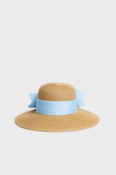 Exclusive Blue Packable Wide Bow Sunhat Summer Blue Straw Travel Hat, Elegant Straw Hat For Pool, Summer Travel Blue Straw Hat, Blue Chic Straw Hat For Summer, Chic Blue Straw Hat For The Beach, Chic Blue Straw Hat For Summer, Elegant Adjustable Sun Hat For Pool, Light Blue Summer Hat With Curved Brim, Blue Wide Brim Straw Hat For Travel