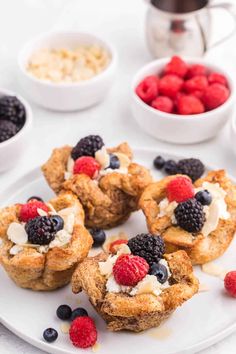 mini muffins filled with berries and cream on a white plate next to bowls of cereal