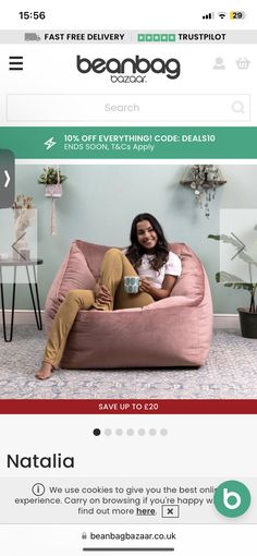 a woman is sitting on a bean bag chair