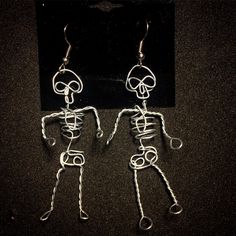 the skeleton earrings are made out of wire