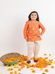 Girls Orange Embroidered Chanderi Dhoti Kurta Sets By Mr Brat now available at Trendroots Anarkali Sherwani For Puja And Diwali, Anarkali Style Sherwani For Diwali Puja, Traditional Pant Set With Pallu For Festivals, Anarkali Pant Set With Zari Work For Festivals, Bollywood Style Pant Set With Zari Work For Festivals, Chanderi Pant Set For Festive Occasions And Diwali, Festive Anarkali Pant Set For Festivals, Orange Chikankari Embroidered Sets For Festivals, Festive Chanderi Pant Set With Gota Work