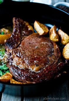 steak, potatoes and carrots on a plate