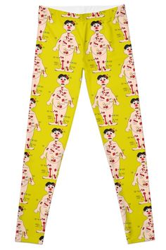 the leggings are yellow with an image of a man in red and white