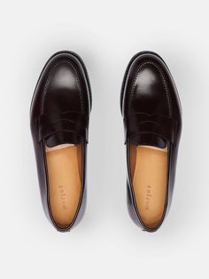 Launched in 2017, The Penny Loafer is our take on a classic staple — Refined and developed for over five years, resulting in a contemporary silhouette that works great with both casual and formal outfits. A superb partner for everyday wear, handcrafted in Almansa with a Goodyear welt and rubber sole, ensuring you can wear them for years to come.    Fits large in size  We recommend selecting half a size down from what you usually wear in lace-up shoes. Please refer to our Size Guide above or reac Classic Oxfords For Office With Stitched Sole, Classic Office Oxfords With Stitched Sole, Classic Goodyear Welted Tassel Loafers For Office, Classic Tassel Loafers With Rubber Sole, Classic Leather Shoes With Stitched Sole, Classic Wingtip Loafers With Rubber Sole, Classic Tassel Loafers For Work, Classic Goodyear Welted Loafers For Work, Classic Wingtip Tassel Loafers For Office