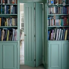 an open door leading to a library filled with books