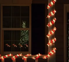 christmas lights on the outside of a house