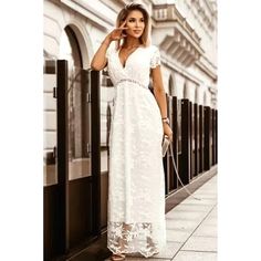 Limited Edition! Make A Statement In This Stunning Boho White Lace Bridal V-Neck Maxi Dress From Ditzys Boutique. Made From High-Quality Polyester And Featuring A Solid Pattern With Short Sleeves, This Dress Is Perfect For Any Occasion. The Elegant V-Neckline And Long Dress Length Provide A Touch Of Sophistication, While The Lace Fabric Adds A Bohemian Vibe. Whether You're Attending A Wedding, Holy Communion, Party, Or Just A Casual Day Out, This Dress Will Make You Feel Confident And Stylish. I White V-neck Short Sleeve Party Dress, White Fitted V-neck Maxi Dress, White V-neck Fitted Maxi Dress, Elegant White V-neck Maxi Dress, White Maxi V-neck Party Dress, White V-neck Party Dress With Short Sleeves, White Short Sleeve V-neck Party Dress, Elegant Lace V-neck Maxi Dress, Chic White V-neck Dress For Wedding