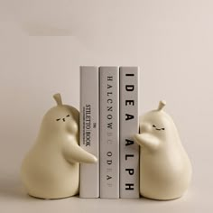 two white bookends that have been placed next to each other