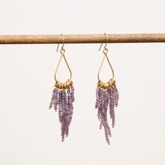 Amethyst Chandelier Earrings Amethyst semi precious stones wire wrapped on teardrop setting and gold filled ear wires Approximate dimensions L 3 X W 1 inches Teardrop Brass Beaded Earrings With Ear Wire, Handmade 14k Gold-filled Chandelier Drop Earrings, Gold Amethyst Long Drop Earrings, Gold Teardrop Chandelier Earrings In 14k Gold Filled, Gold Teardrop Chandelier Earrings, Brass Teardrop Chandelier Earrings With Ear Wire, Teardrop Brass Chandelier Earrings With Ear Wire, Gold Wire Wrapped Chandelier Earrings, Gold Wire Wrapped Long Drop Chandelier Earrings