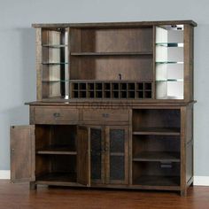 a wooden cabinet with glass doors and shelves