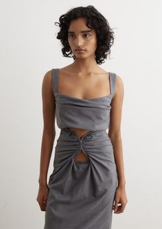 Launched in 2015, New Zealand-based label Paris Georgia brings a unique combination of clean lines, luxurious fabrics, and subtle hues to its offerings of timeless ready-to-wear pieces celebrating the beauty of the female form. Crafted from Australian wool, the Amara Bustier Top is designed with a cowl neckline, and cropped fit.  - Australian Wool- Cowl neckline- Shoulder straps- Slim fit Materials:Main: 100% Wool, Lining: 100% Viscose. Care:Dry clean only. Sizing: Item fits true to size. Model wears a size S and is 173cm/5'8". Paris Georgia, Wool Cowl, Bustier Top, Luxury Fabrics, The Beauty, Crop Tops Women, Fashion Photography, Georgia, Shopping Outfit