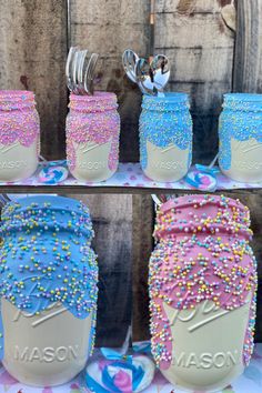 mason jars decorated with sprinkles and forks