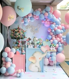 an elephant themed birthday party with balloons and decorations