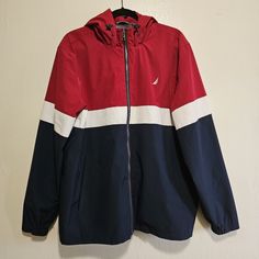 Used Only A Few Times Looks Brand New No Flaws Pit To Pit: 26 Inches Length From Center: 29 Inches Sleeve Length From Center Of Jacket To End Of Arm: 35 Inches Shell: 90% Polyester 10%Spandex Lining: 100% Polyester Made In China Navy Casual Weatherproof Windbreaker, Casual Navy Weatherproof Windbreaker, Navy Casual Hooded Jacket For Outdoor Activities, Casual Navy Hooded Jacket For Outdoor Activities, Casual Navy Windbreaker With Adjustable Hood, White Long Sleeve, Color Block, Red And Blue, Red White