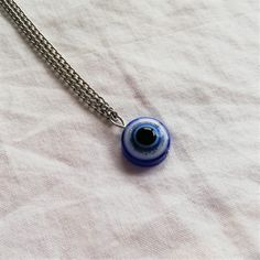 Evil Eye Necklace, Tiny Evil Eye Pendant, Blue Evil Eye Necklace, Nazar Necklace, Protection Necklace, Evil Eye Pendant, Mystical Jewelry Turkish Evil Eye necklace is perfect to wear against any and all evil that you may run across in your lifetime. *The jewelry will be sent in a little bag, ready to be given as a GIFT Approximate pendant dimensions are about 0.7 x 0.5 inches. Necklace lenght: It can be 13, 14, 15, 16, 17, 18, 19 and 20 inches. Please choose which one you want :) I ship your jew Nazar Necklace, Blue Evil Eye Necklace, Necklace Evil Eye, Mystical Jewelry, Turkish Evil Eye, Protection Necklace, Blue Evil Eye, Eye Pendant, Evil Eye Pendant